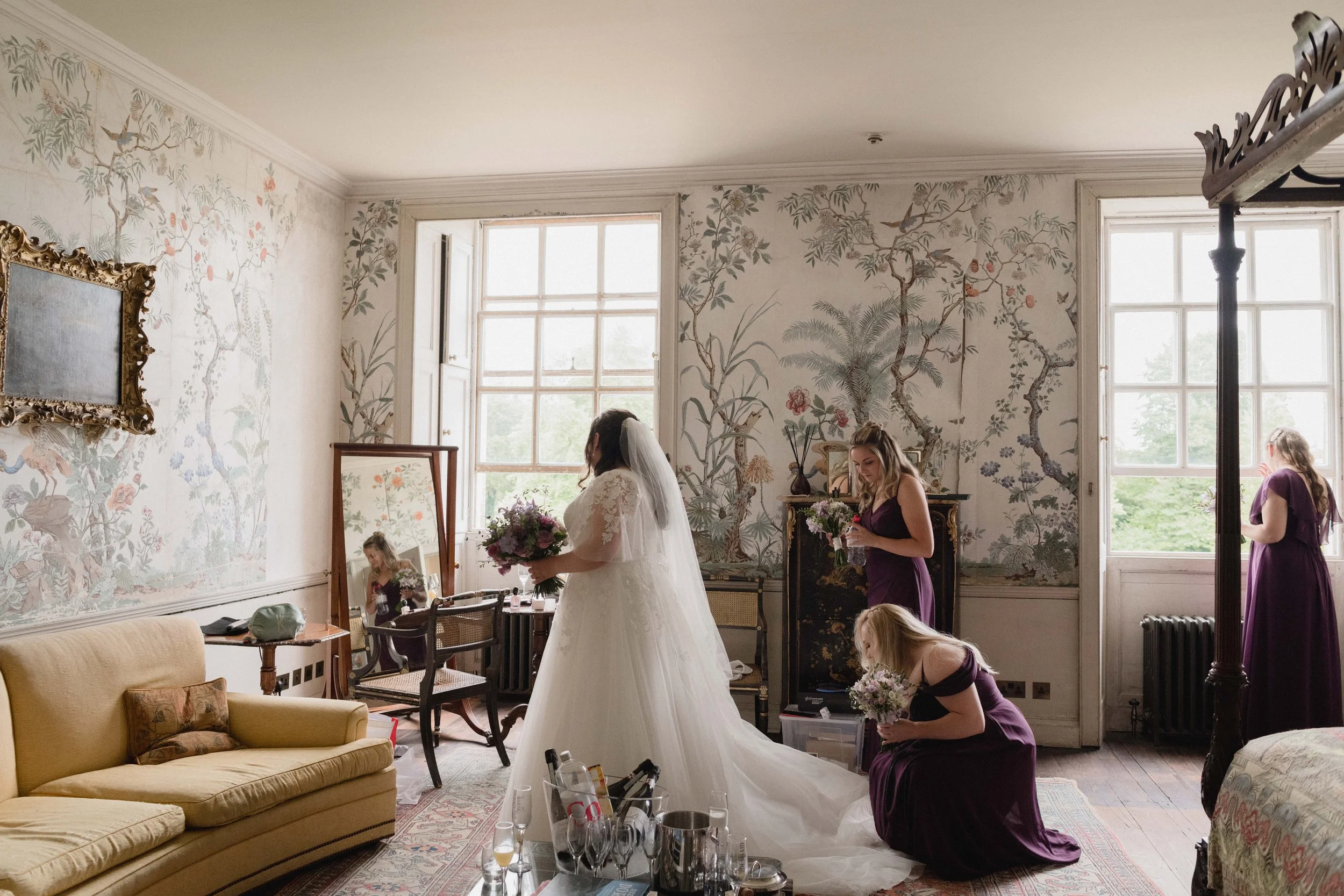 bride and her maids getting ready in the Japanese room at St Giles House