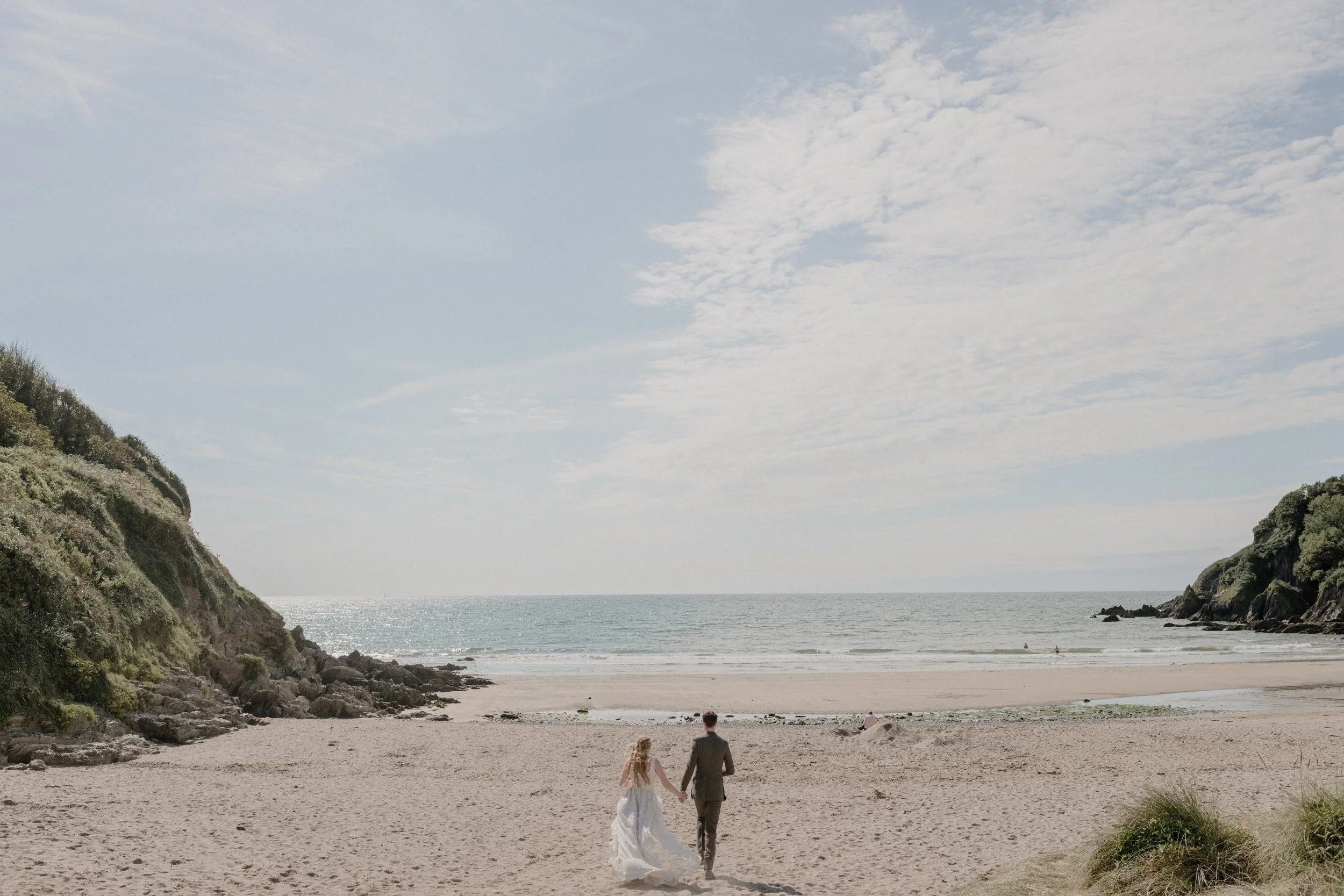 running down to the riptide at mothercombe bay for an outdoor Devon wedding