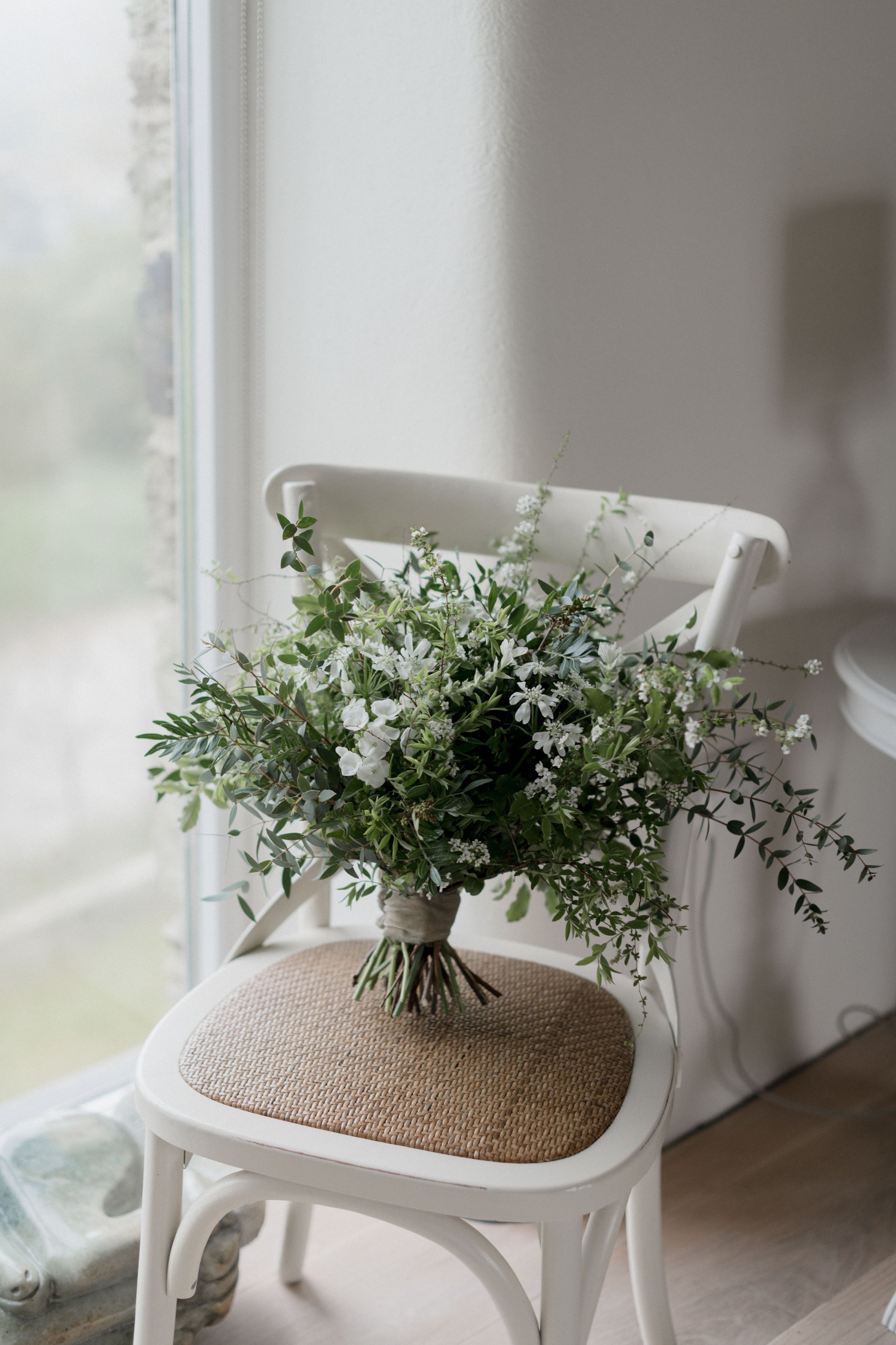 Greenery bridal bouquet for spring wedding in Cornwall by Lafonia flower company captured by alternative wedding photographers