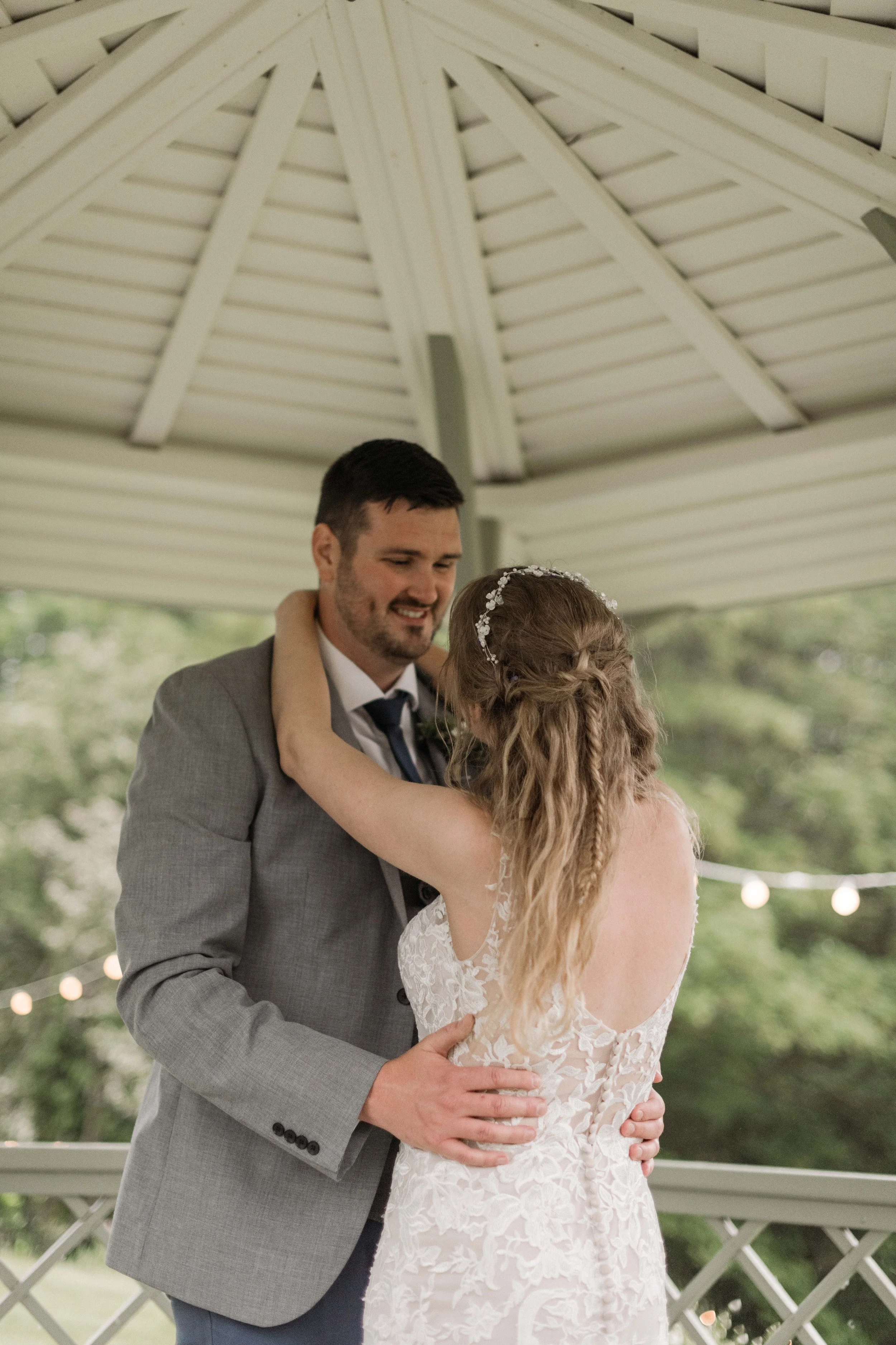 bride and groom having outdoor first dance in pagoda at cornish wedding venue