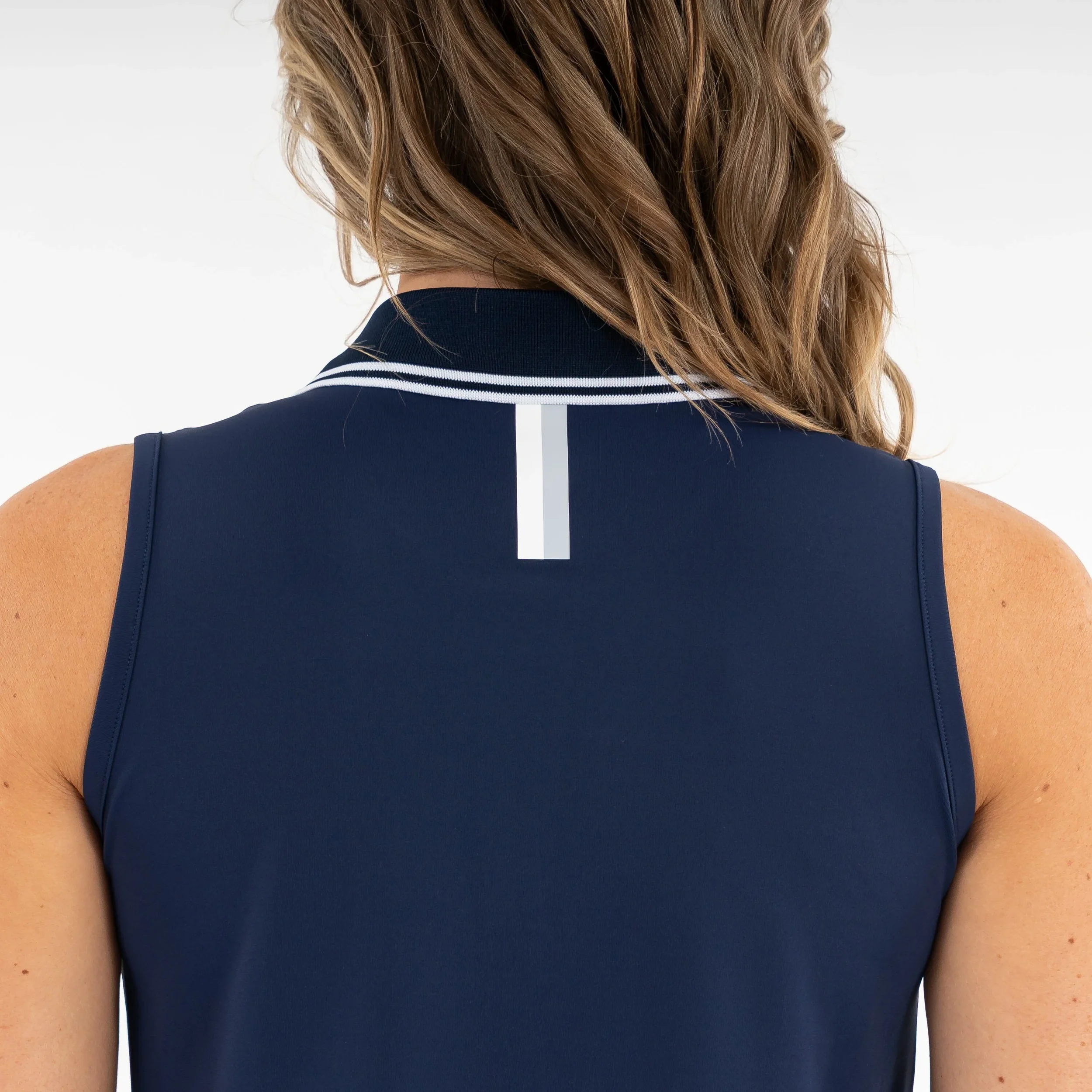 SOLID_FLEET_NAVY_BROOKE_SLEEVELESS_POLO_4.webp