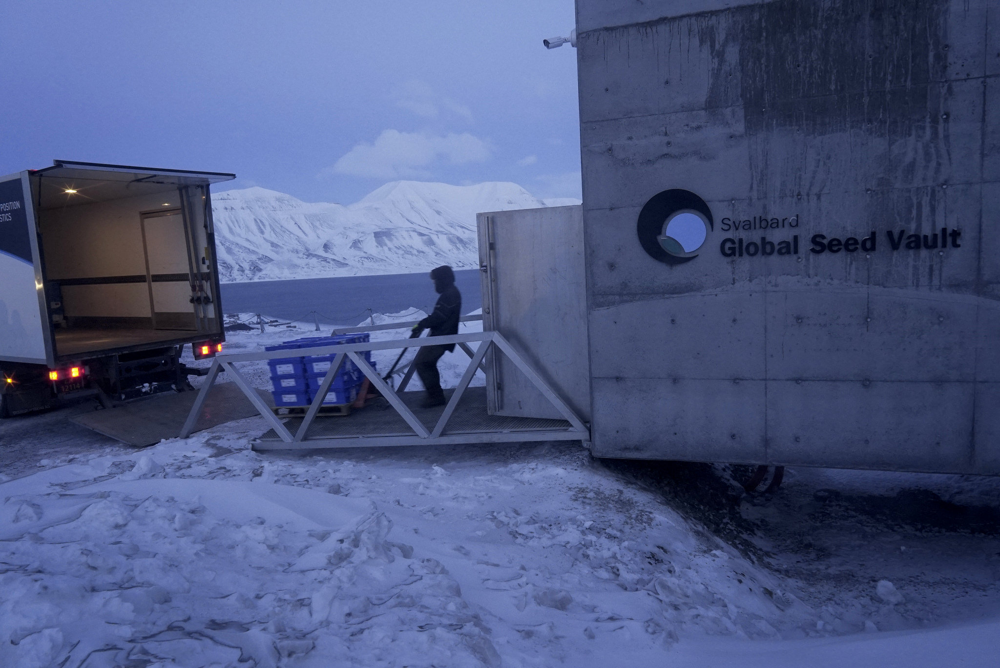  Pallets of seed boxes are ushered through Svalbard’s entrance. 