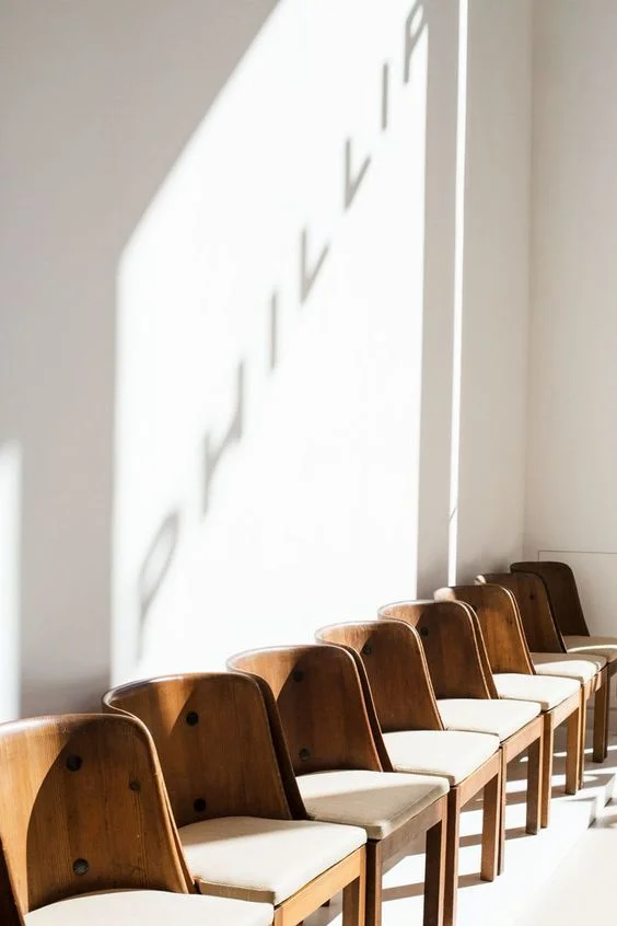 Phillips, Nordic Auction in Berkeley Square, London. AXEL EINAR HJORTH , SET OF TEN CHAIRS, FROM THE ‘LOVÖ’ SERIES, CIRCA 1932 , MADE OF PINE, IRON AND FABRIC, PRODUCED BY AB NORDISKA KOMPANIET STOCKHOLM, SWEDEN (SOLD FOR £50,000). Photo AMANDA KHO