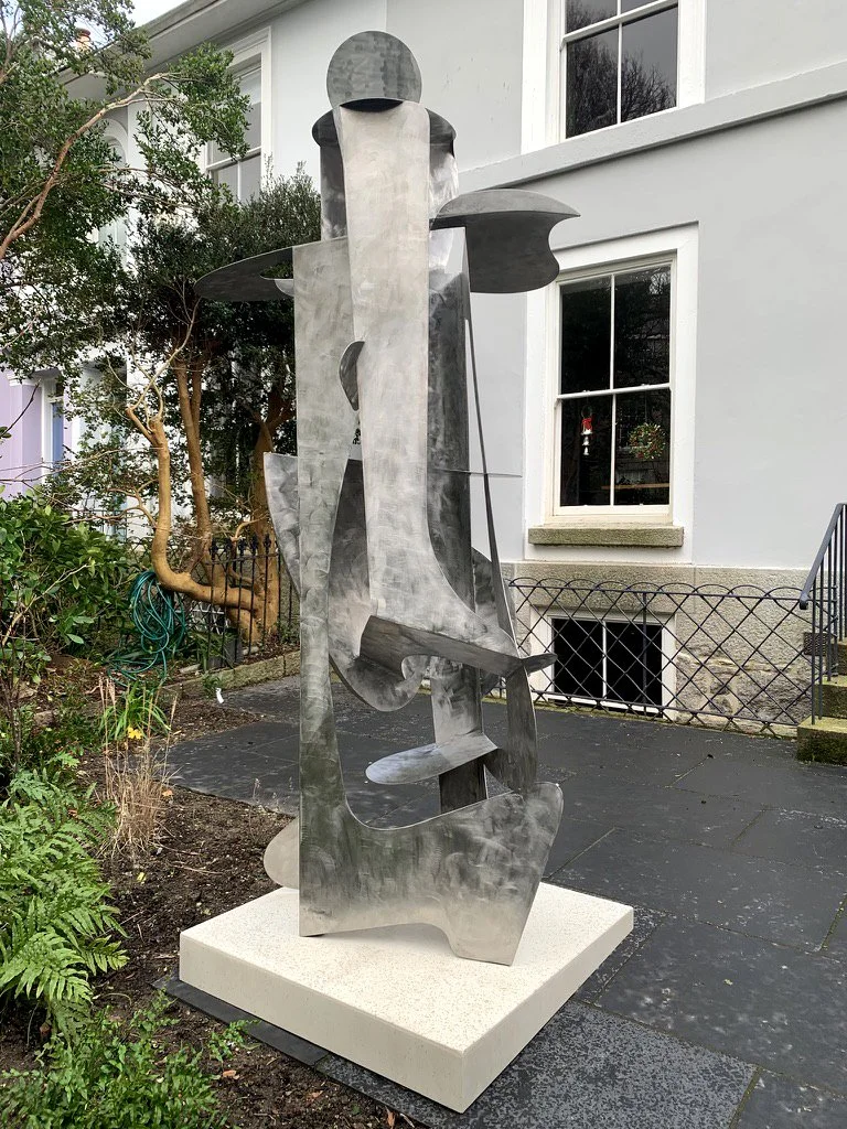 Private commission. Stainless steel on Jesmonite plinth. 280cm x80cm x 80cm. 2025