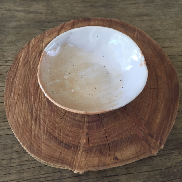 One of the finished bowls. I love its authentic beauty and raw imperfection. I also made these wooden plates from a giant Eucalyptus tree I found in the neighborhood. Eucalyptus trees are a very hard dense wood and have lots of natural oils in them. This naturally creates a water resistant surface on the wood. Then I sealed them with Bees-Wax. Bon appetit!