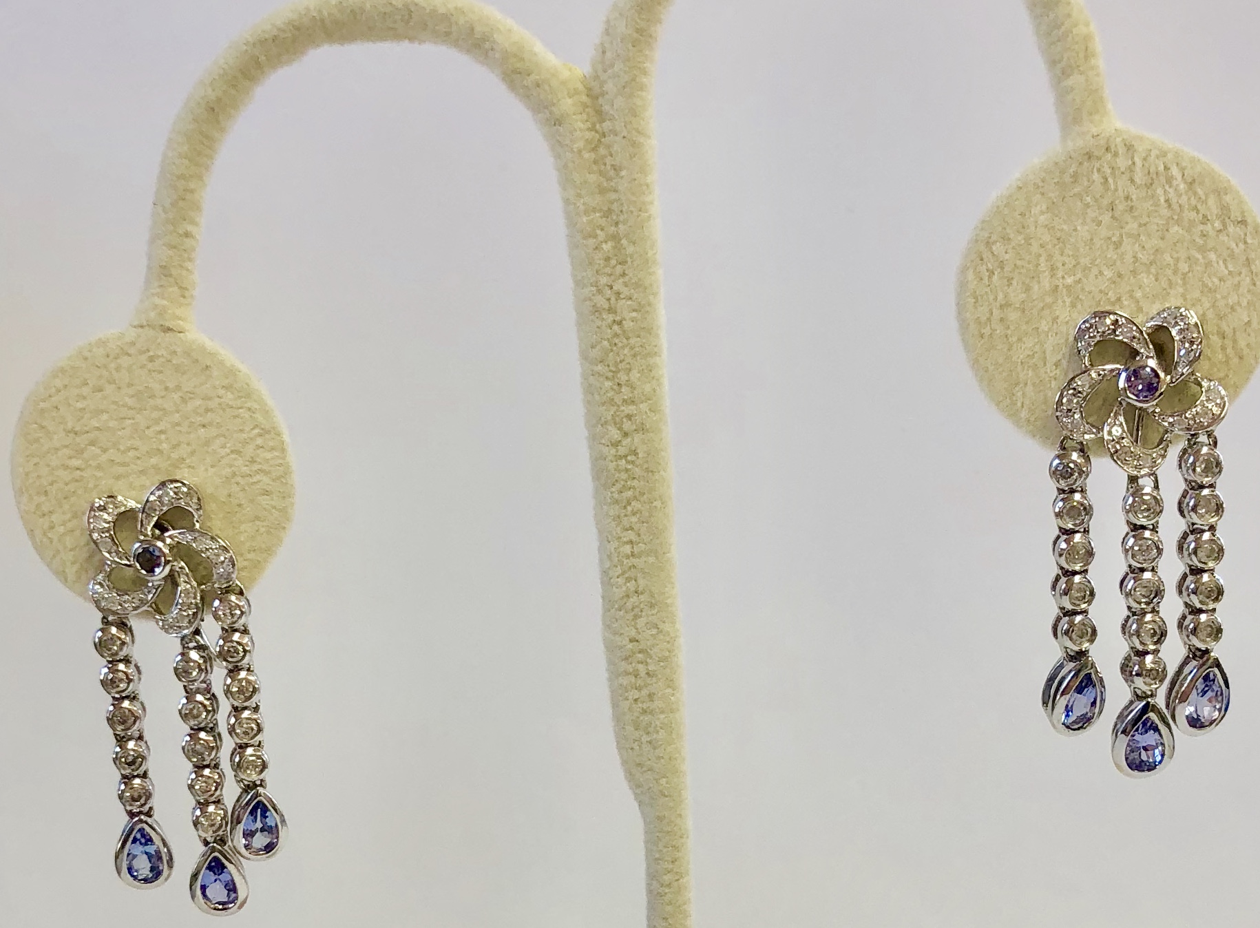 Item no.24 USD645 Stamped 10K White Gold Tanzanite and Diamond Chandelier Earrings. Beautiful dangling earring with lots of shiny diamonds and lavender tanzanites. 8.3 grams