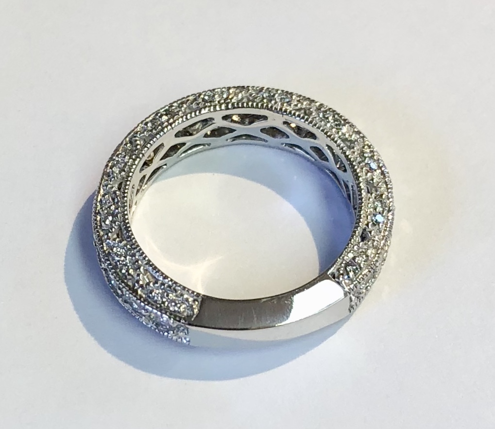 Item no AB154 USD1,275 14k White Gold Diamond Band Lots of fine milgrain work around very high quality diamonds. This ring sparkle something amazing. Approximately 1 carat of diamonds. Size 7 1/8, some small sizing possible.
