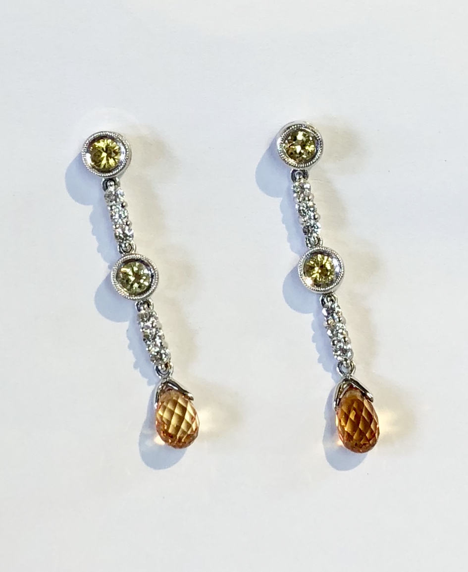 Item No A25 USD475 18k White Gold Diamond, Sapphire and Citrine Earrings Dangle earrings with style and beauty. Approximately .36 diamonds with lovely briolette citrine and round yellow sapphires. Lovely quality.