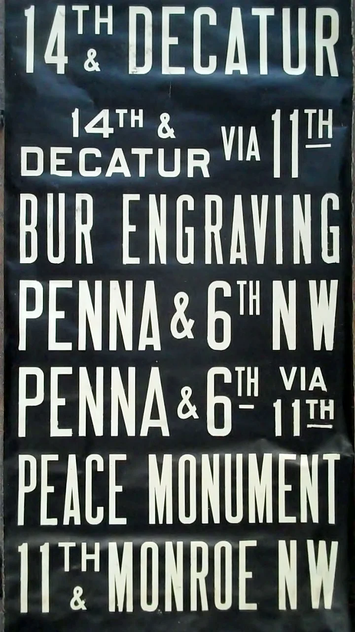 DC Transit Bus Banners are available now at Corehaus! $100 per foot—the sample here is 6’ long.
Come in and pick a section.  We can also build a custom light box out of salvaged DC timbers on request.