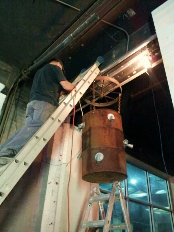 Installing a drum-light at thewaterstproject.com Grand opening tonight! #corehaus #thewaterstproject.