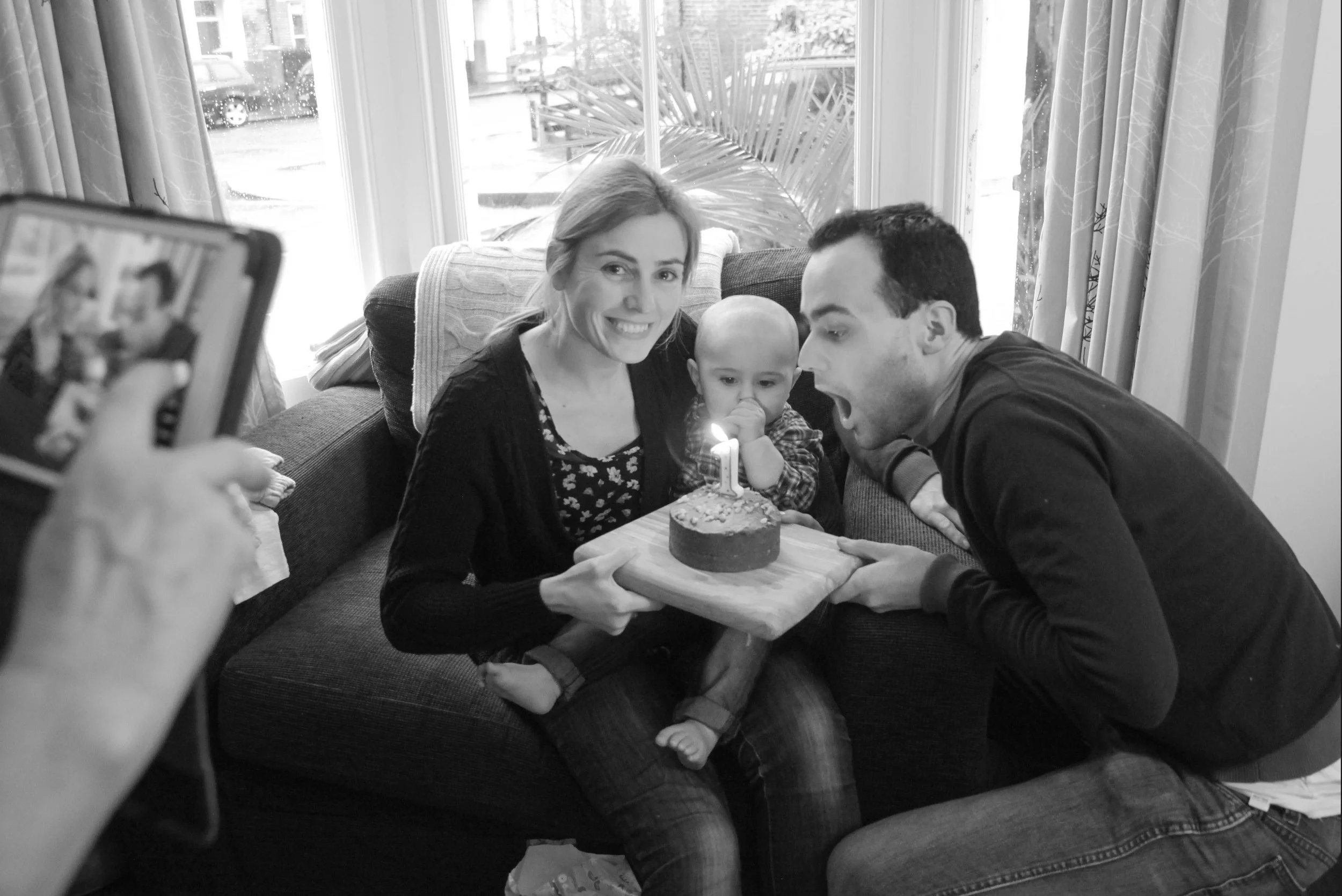 Finlay Collins admires his very first birthday cake.