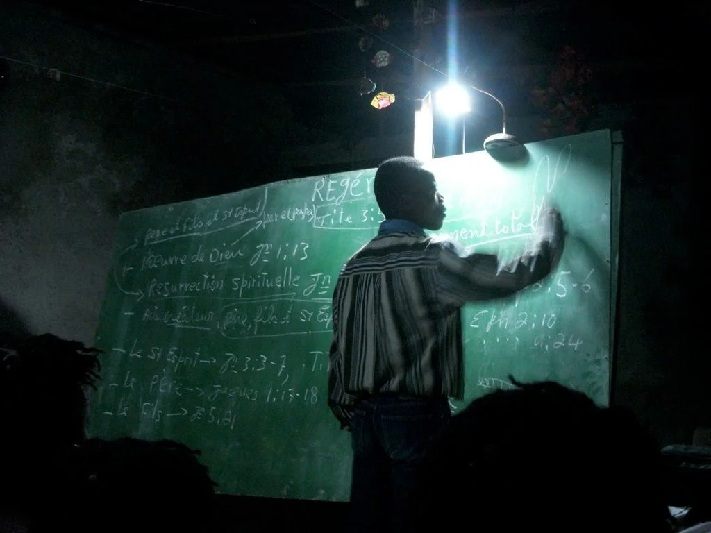 Rev. Daniel Paul teaching evening Bible Class