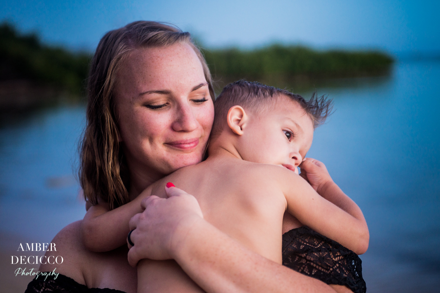 Mom and son looking at the ocean