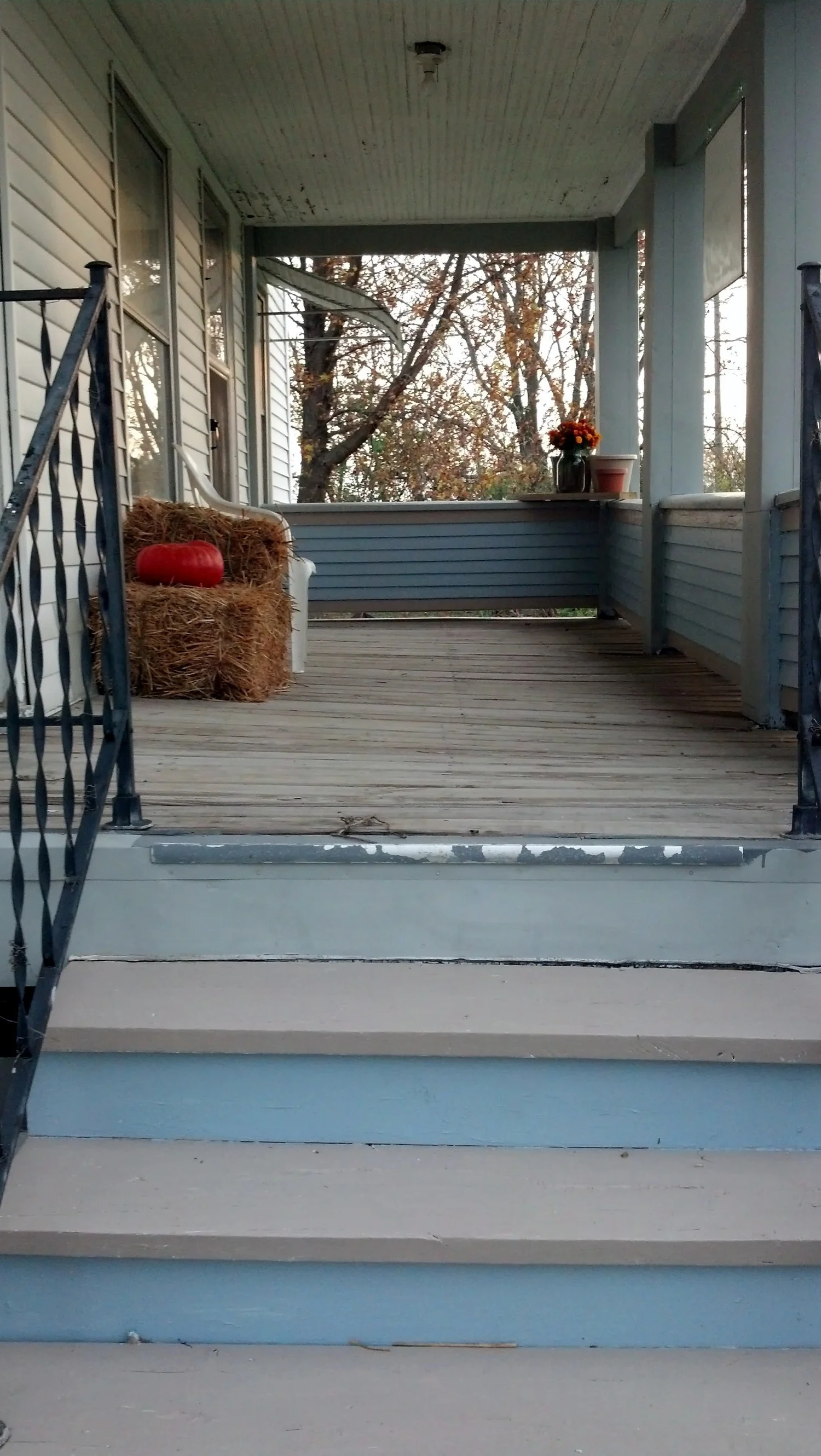 There are a lot of blues and browns in the house which I reflected when re-painting the inside of the porch earlier this fall.  The floor looks a little wavy, but its really quite sturdy, I promise. 
