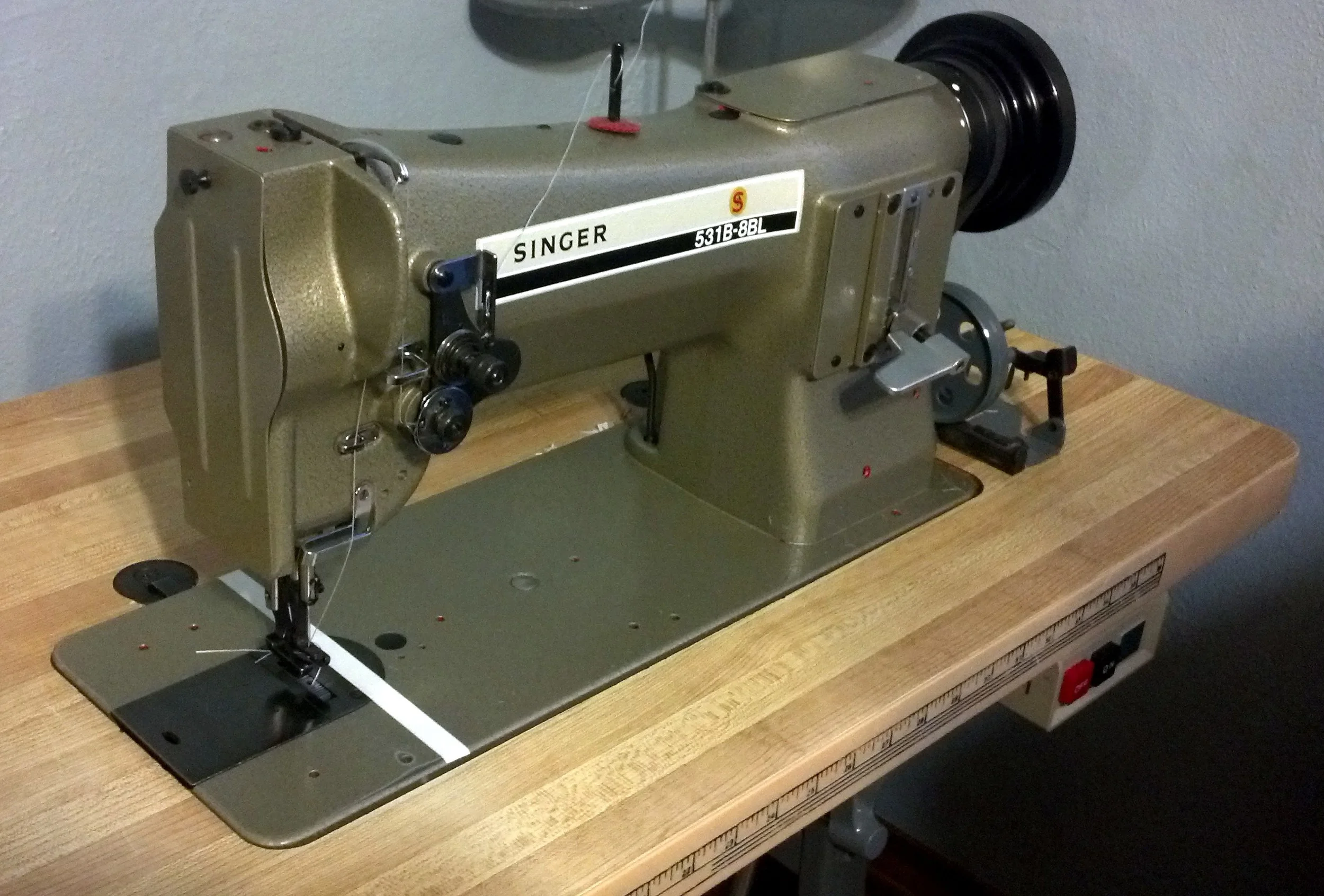 This is my industrial Singer sewing machine.  Its a walking foot machine which can easily sew through multiple layers of thick or tough fabric. This was my first big purchase for the business which I was very excited to find through craigslist.…