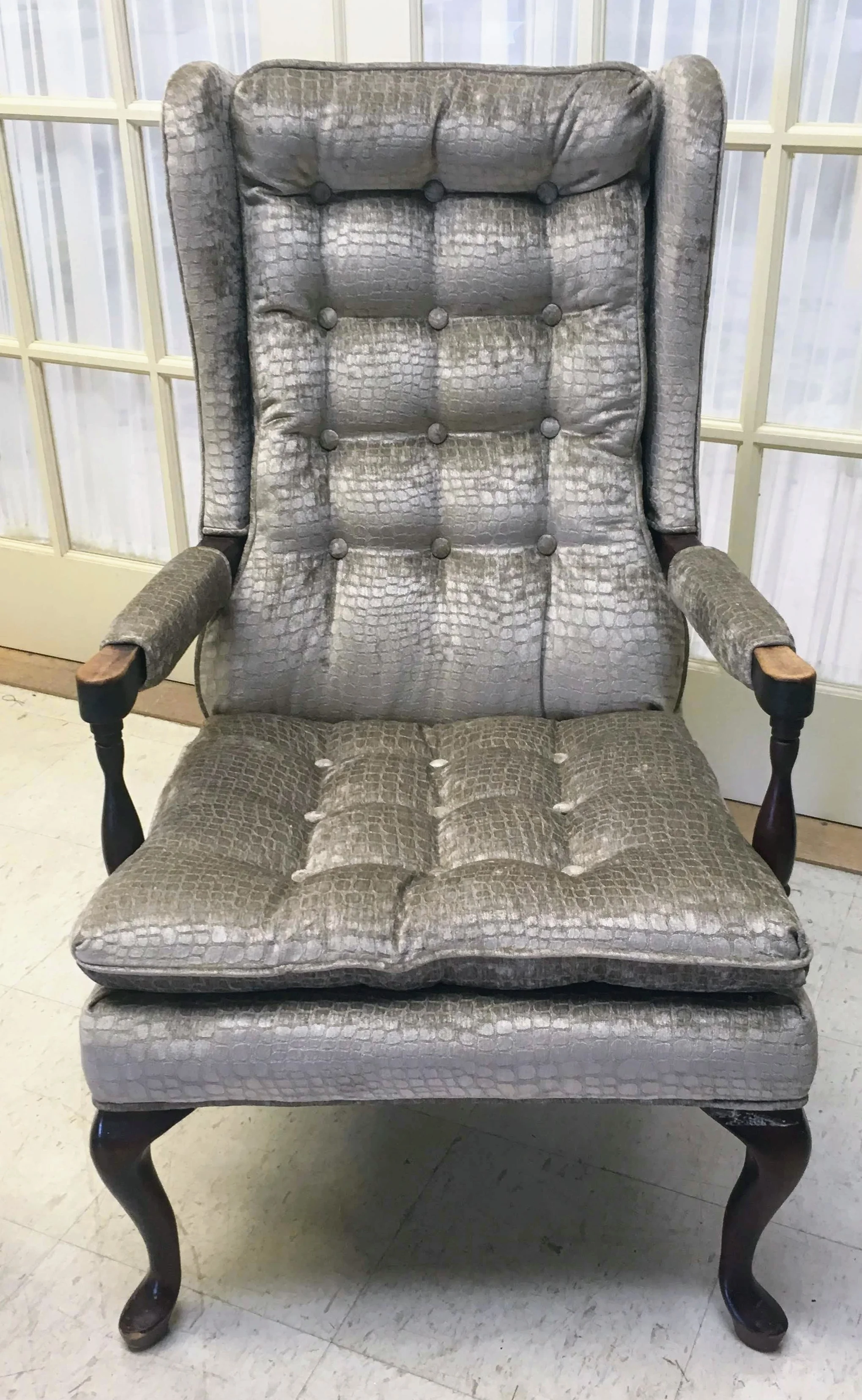 small button-back wing chair
