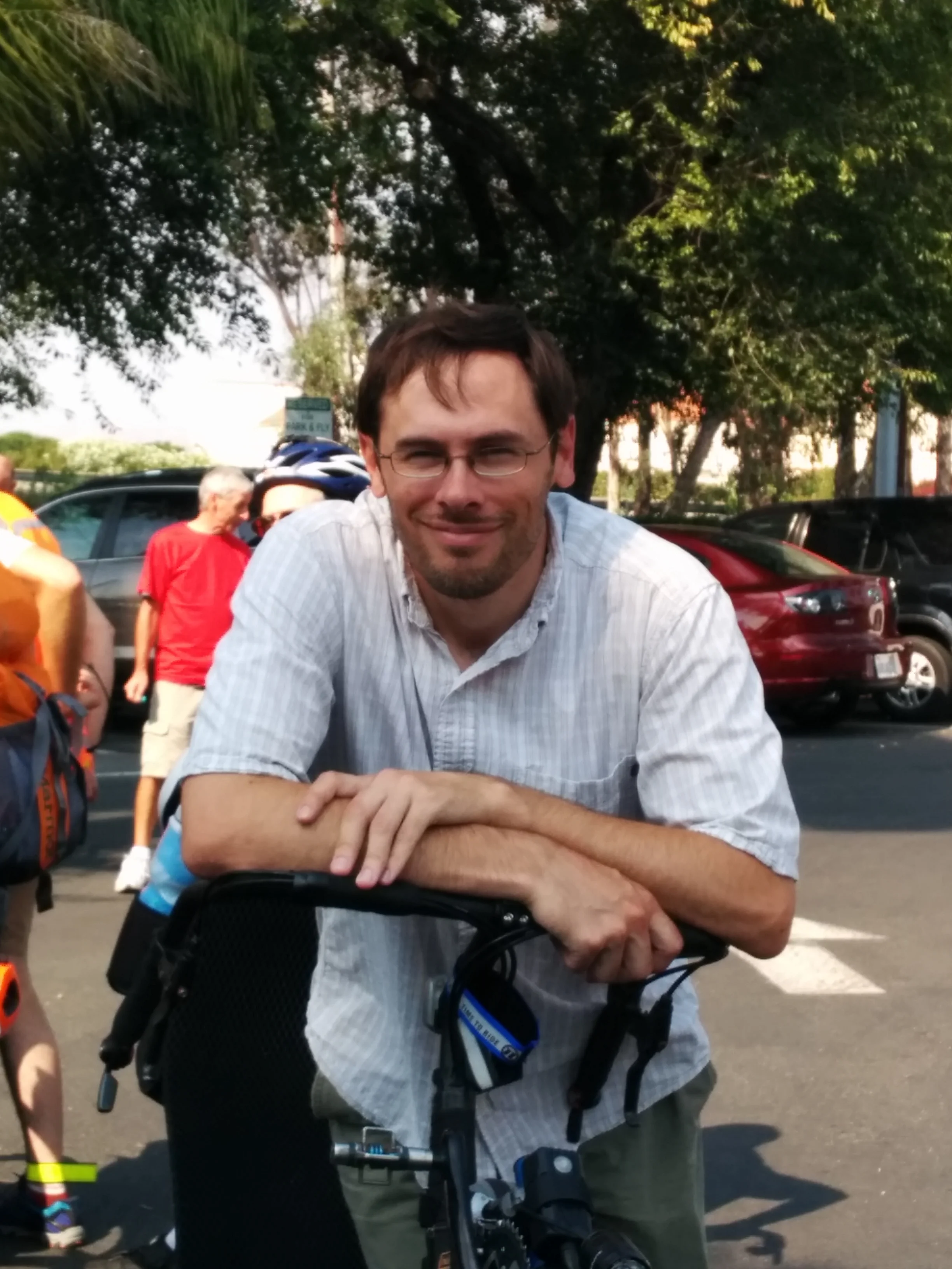 Matthew leaning on bike: by Stacy Kline (taken at the start of the California Central Coast Randonneé 1200K)