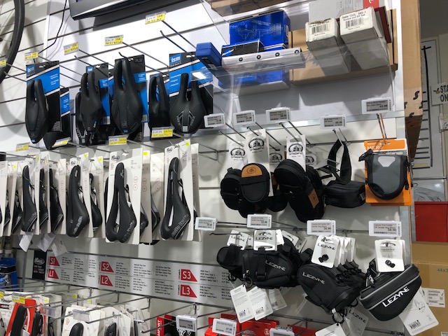Electronic Shelf Labels on accessory product hooks in bicycle retail store 