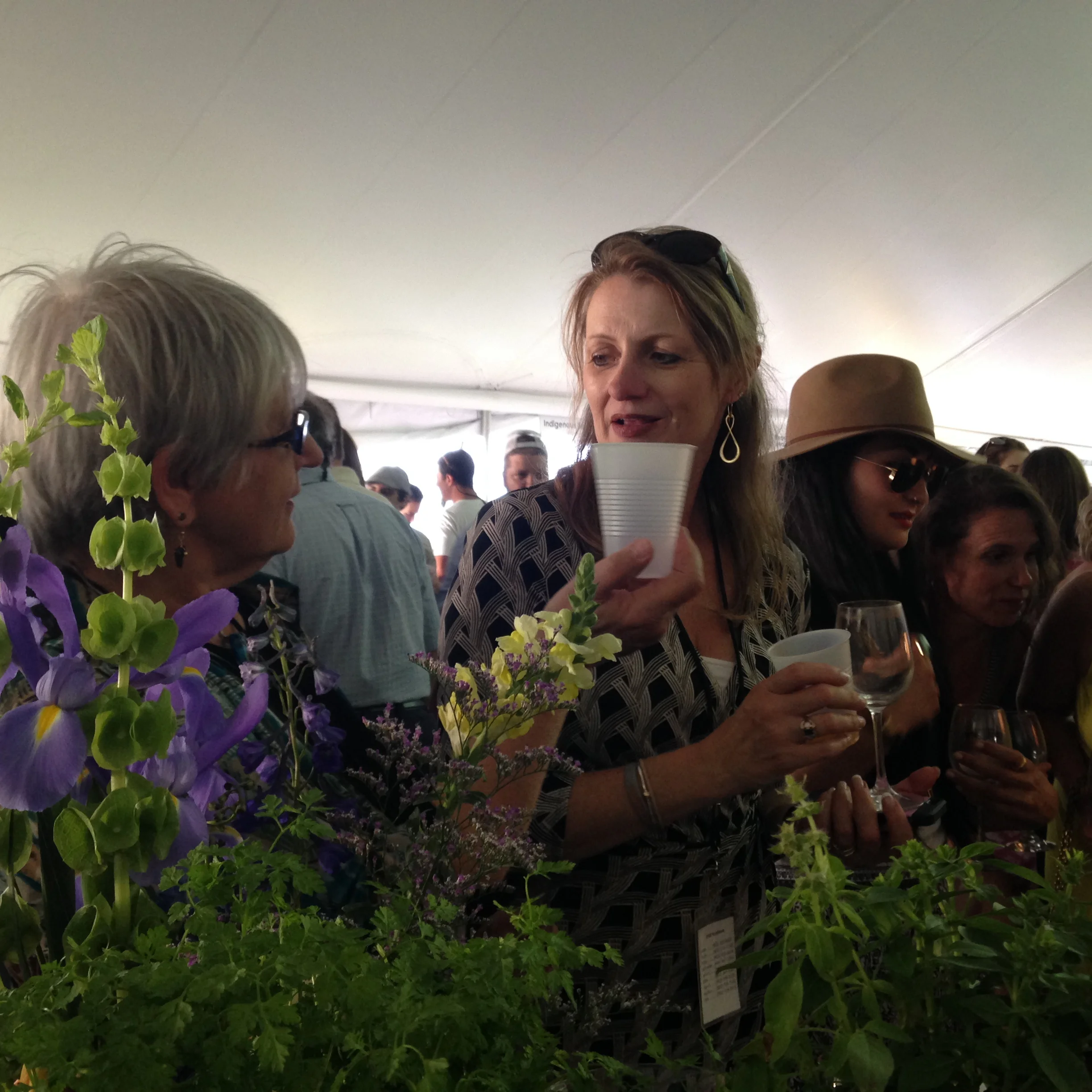 Linda Fox of Vermont's Sumptuous Syrups and Organizer, Tracy Stolese of Vermont Wine merchants experience Alice & the Magician