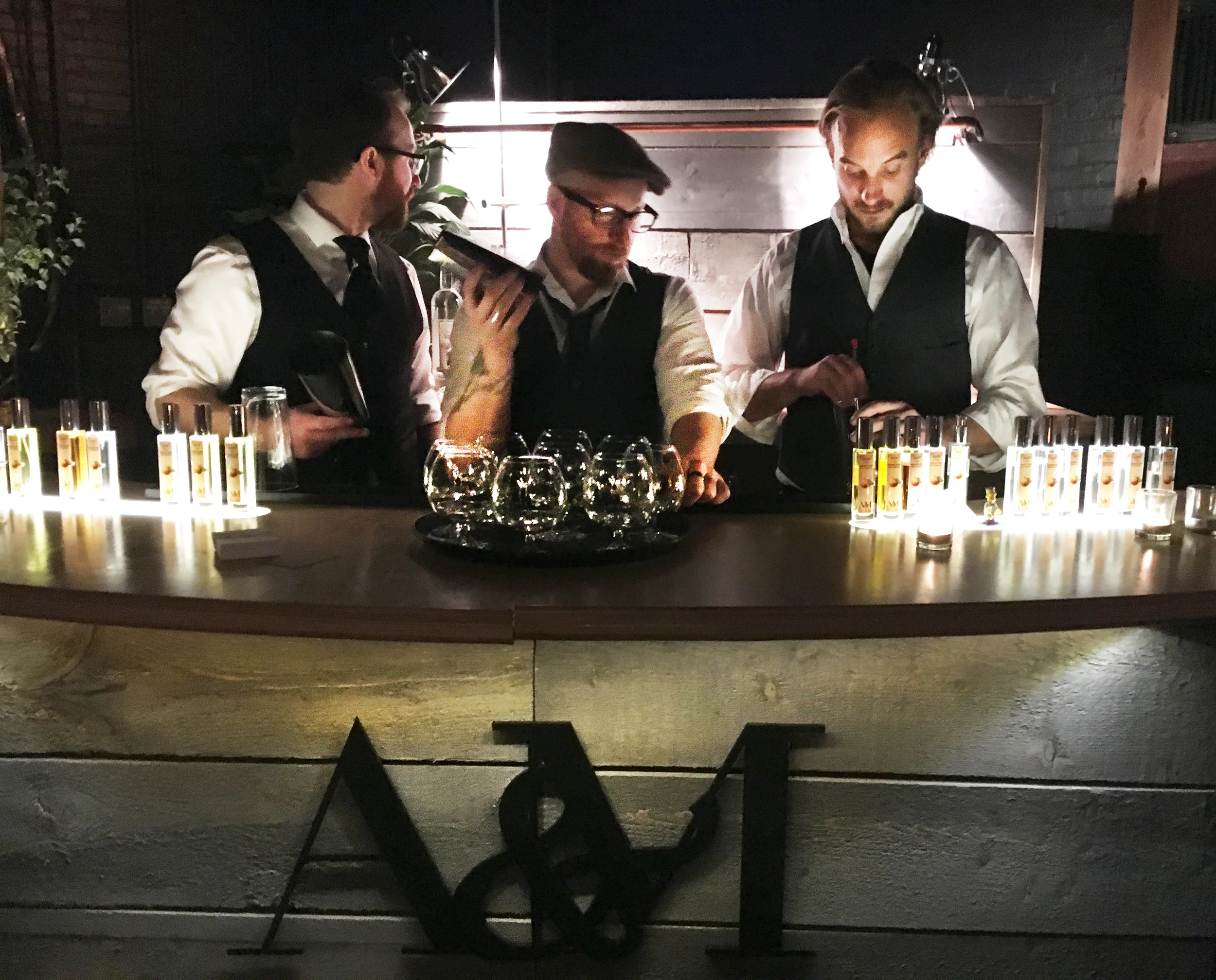 The A&M team with PJ from ArtsRiot mixing round of "corn n' oil"