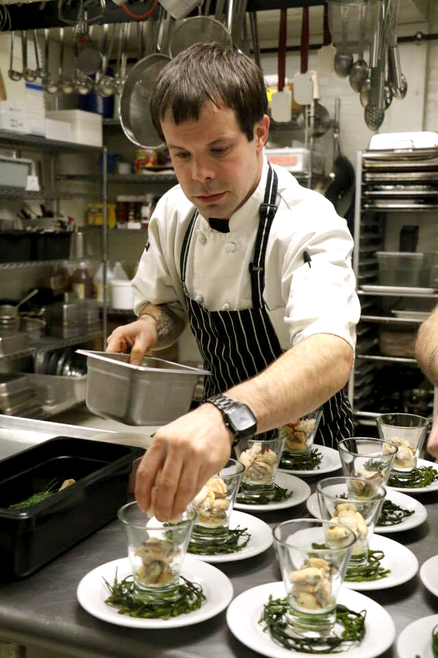 Chef Jean-Luc Matecat plating the first course. Photo by Lindsay Taylor
