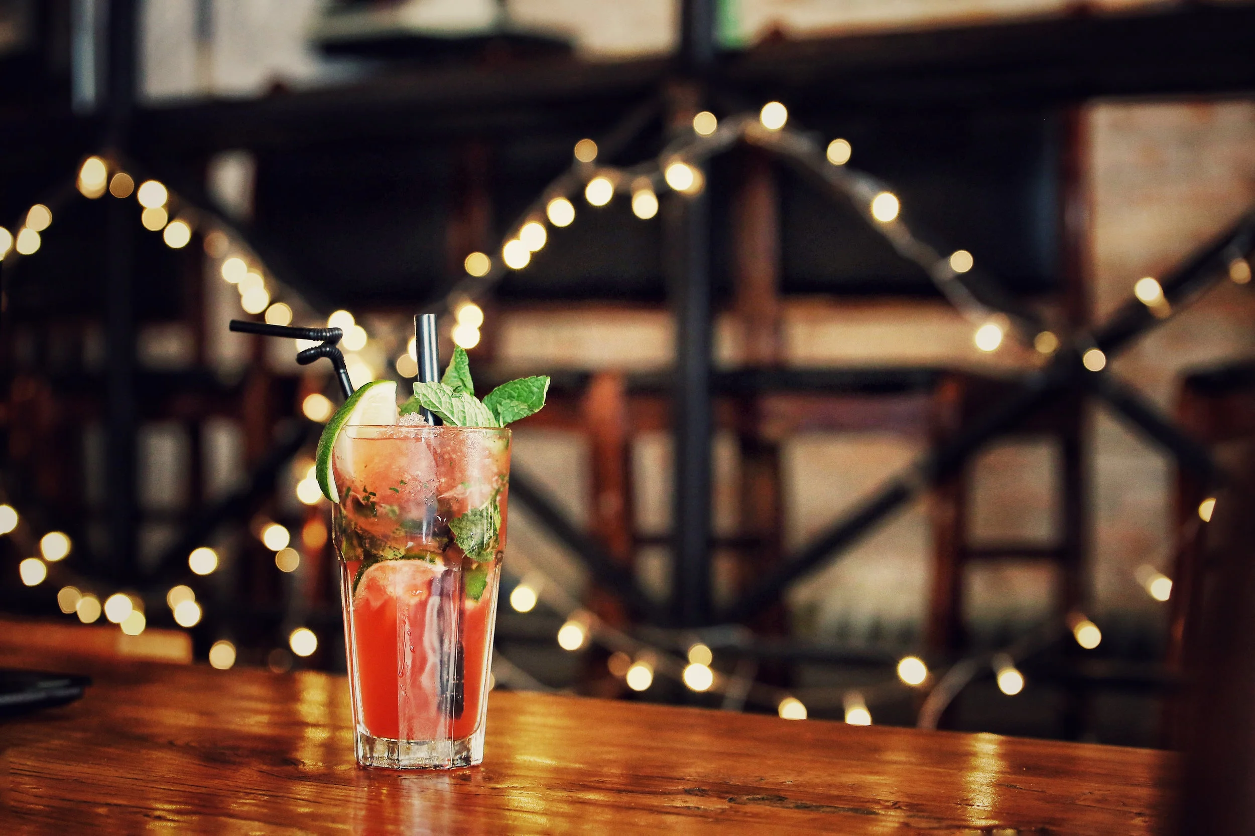 jazzfest cocktail pic with string lights.jpg