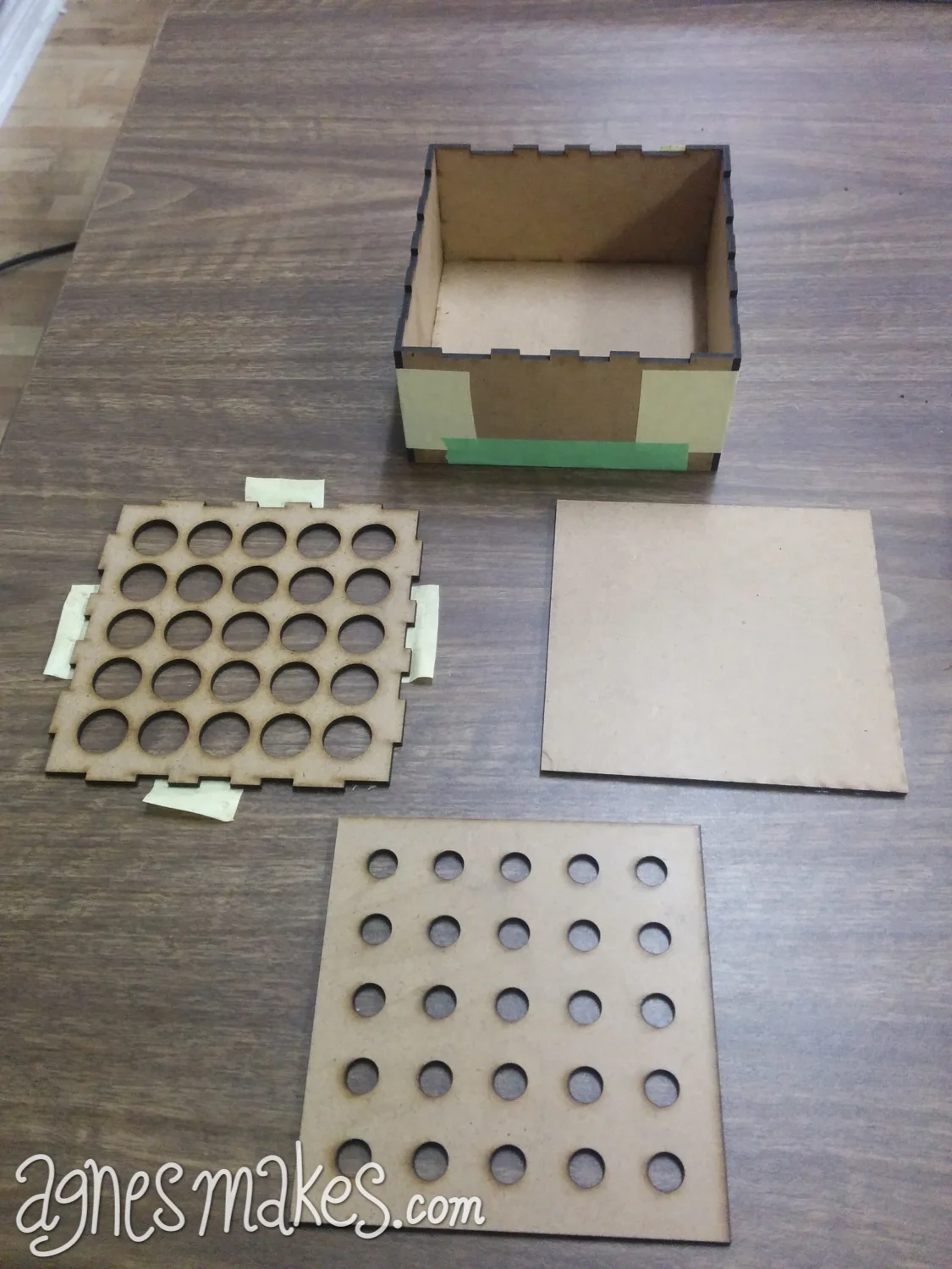 Here are the laser cut hardboard pieces used for the mother mold. I cut two extra pieces to help with alignment and spacing of the glass test tubes.