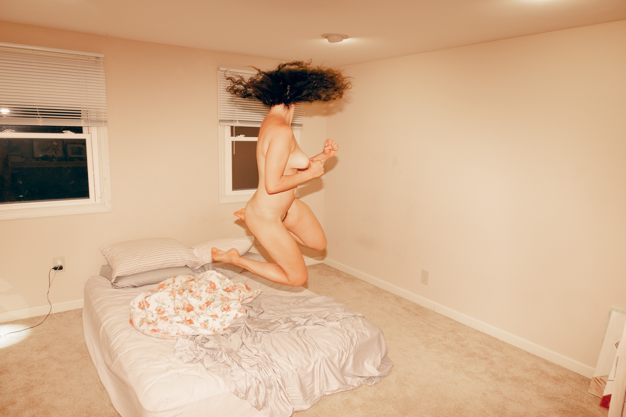 Hannah Jumping into Bed