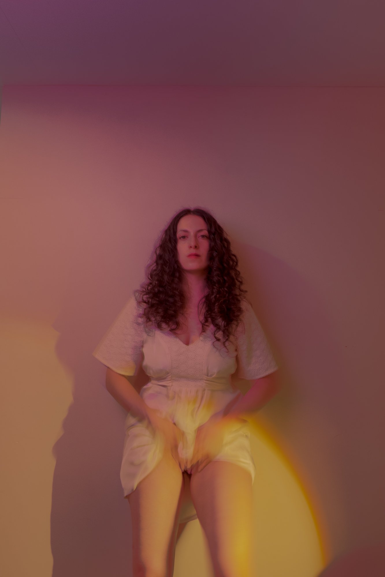 Hannah in a White Dress with Colorful Lights