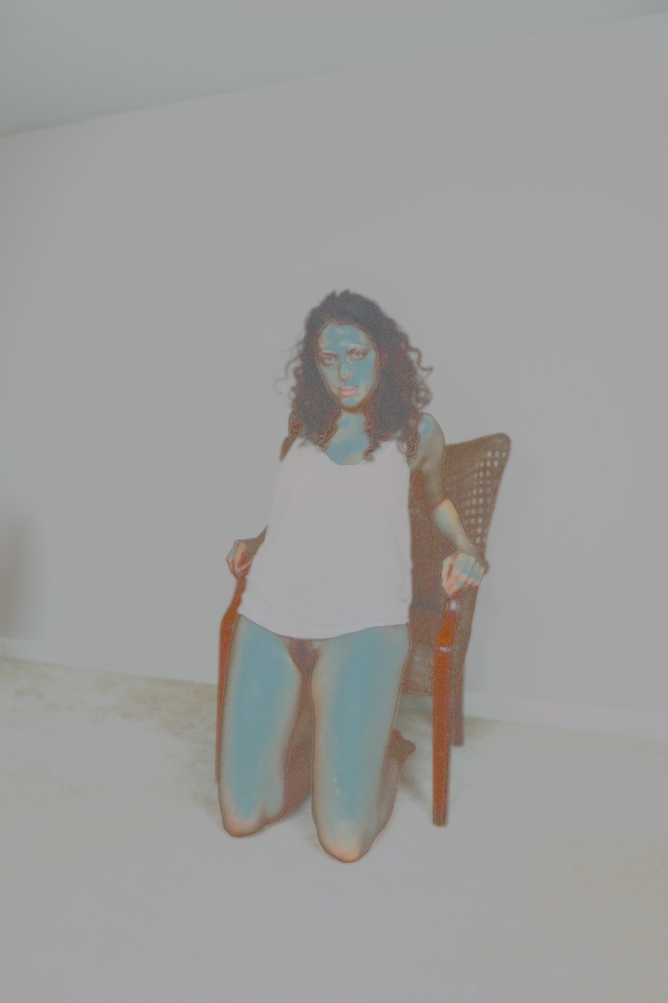 Hannah Against a Chair
