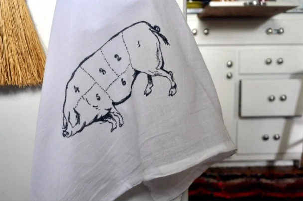 Craft yourself a piglet tea towel