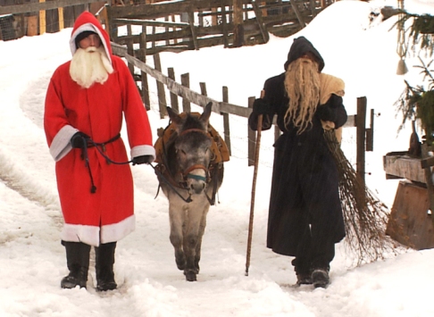 Saint Nicholas arrives with Knecht Ruprecht.