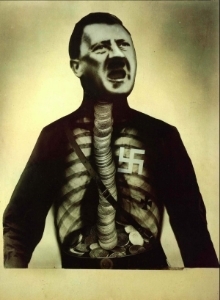 John Heartfield's Adolf Hitler the Superman Swallows Gold and Shits Tin , 1932.