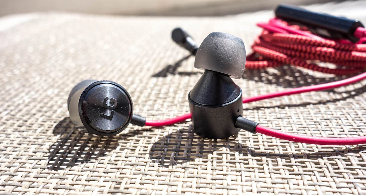LG Quadbeat 3 dynamic driver earphones in red an black colour combo.