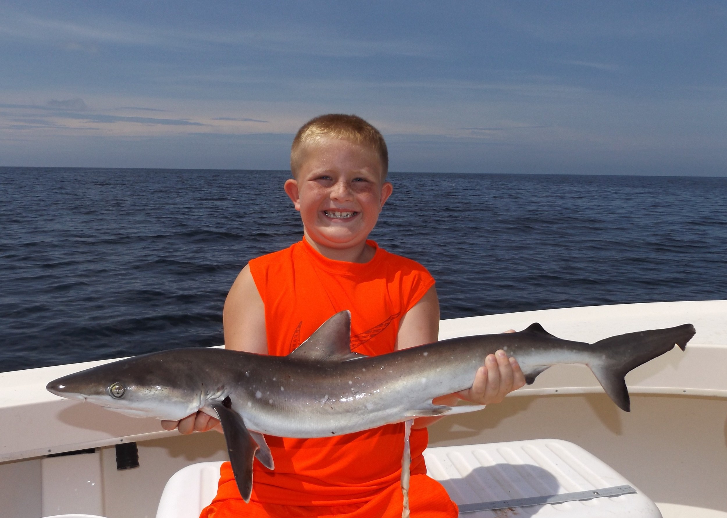 Brody ( The Shark KIng) Kelly of Nebraska with his first-ever shark . He was happy? right?