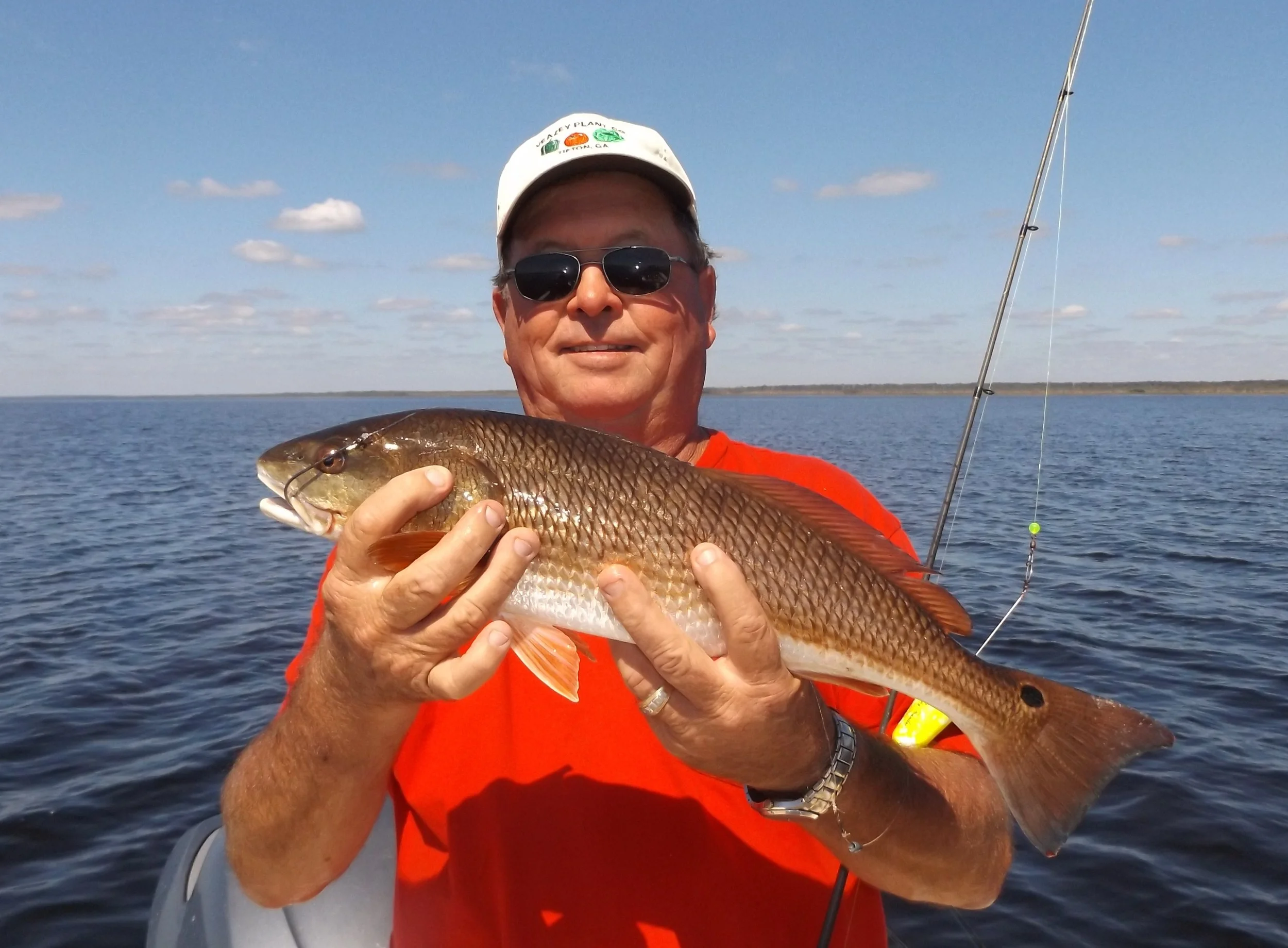  Johnny Veasey of Tifton, Ga with one of several reds caught October 7