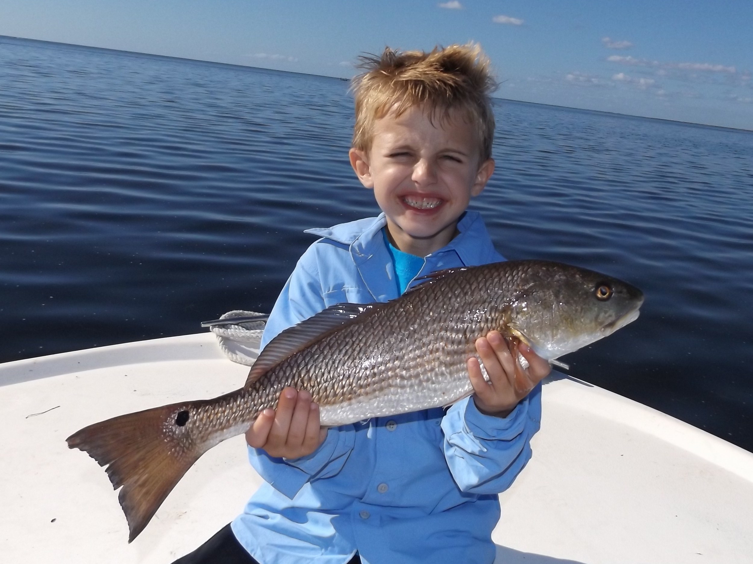 Porter harden of ft. walton beach, Florida with the largest fish of the day! a 21" redfish!