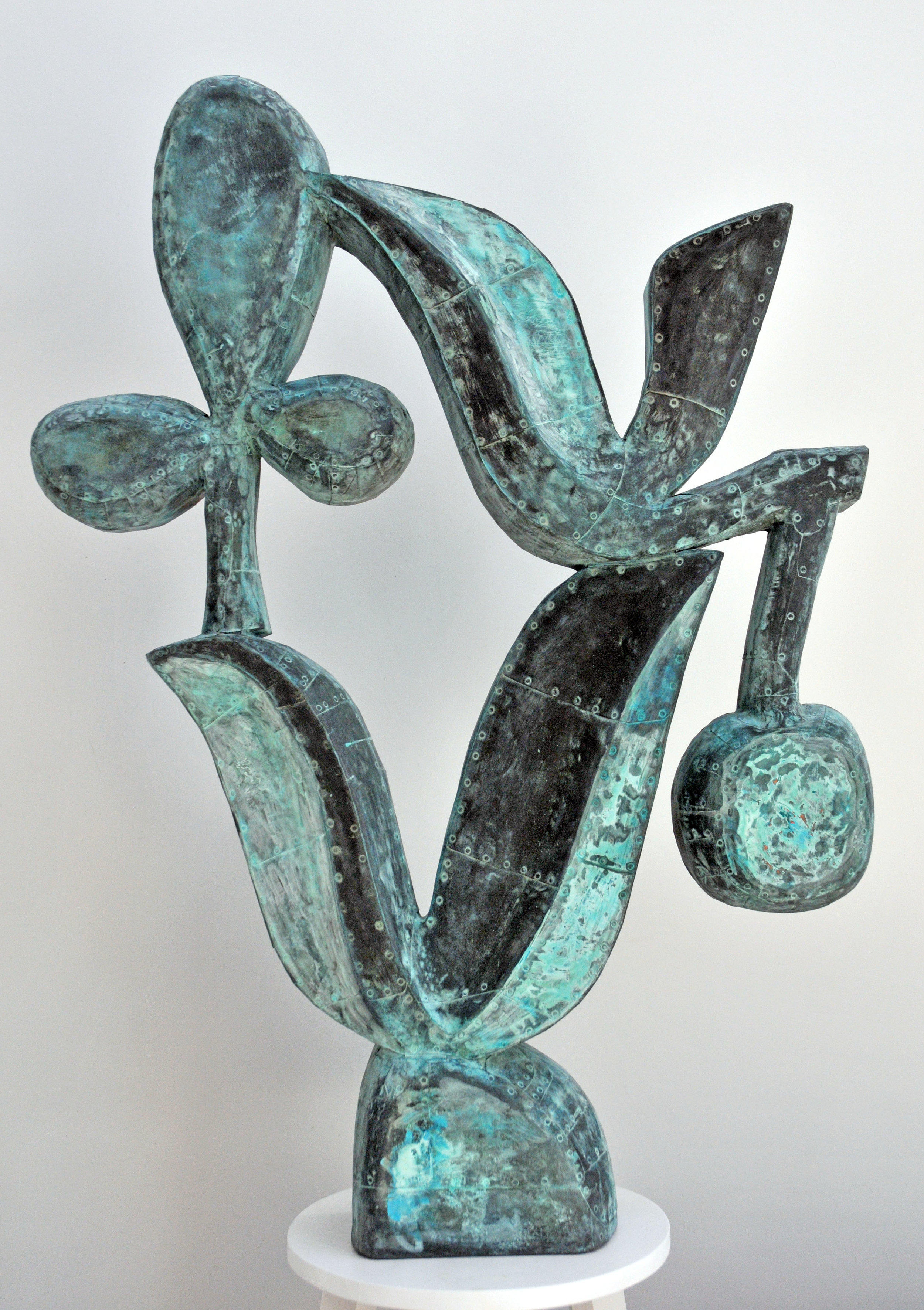 Hybrid, Patinated hammered copper over carved wood, 43" x 32" x 8”