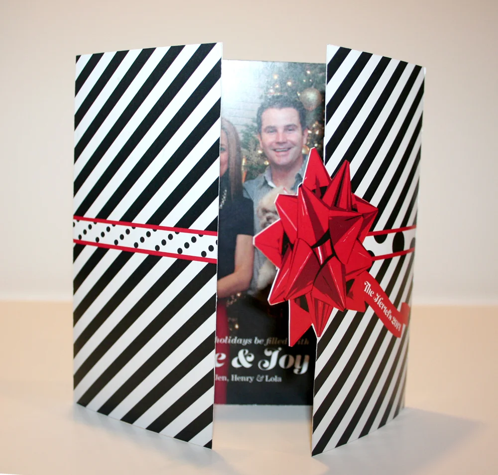 I am obsessed with the custom cut bow and bold stripes!
