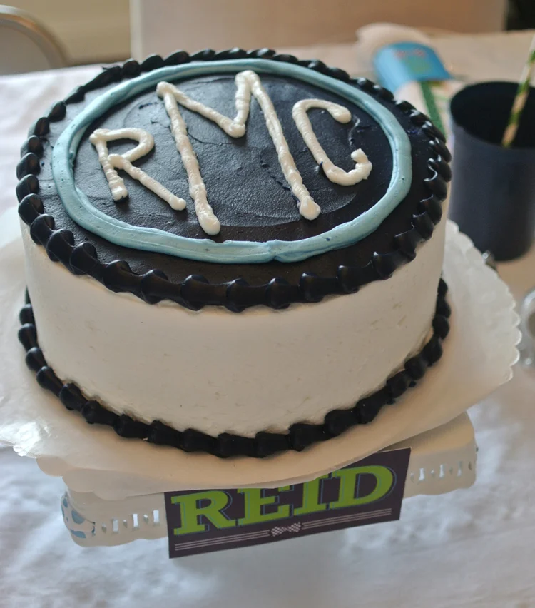 The cutest monogrammed cake was complete with a personalized cake banner. 