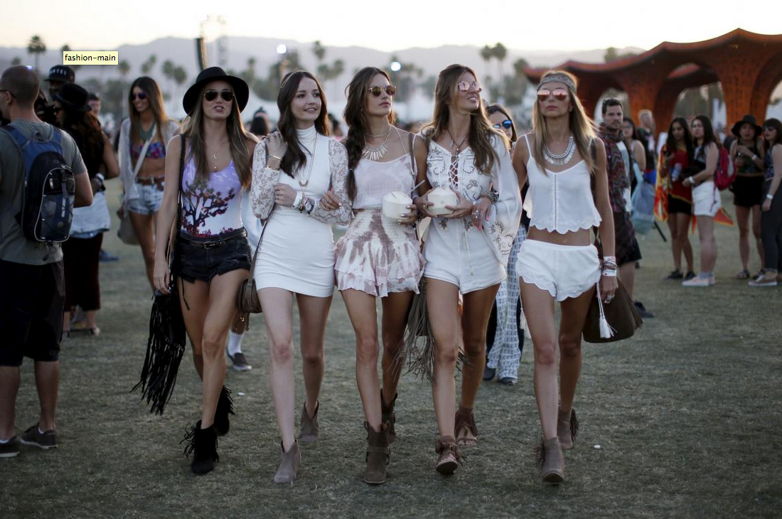 Victoria's Secret model Alessandra Ambrosio of Brazil, center, walks through the Coachella Valley Music and Arts Festival with friends in Indio, California, April 12, 2015