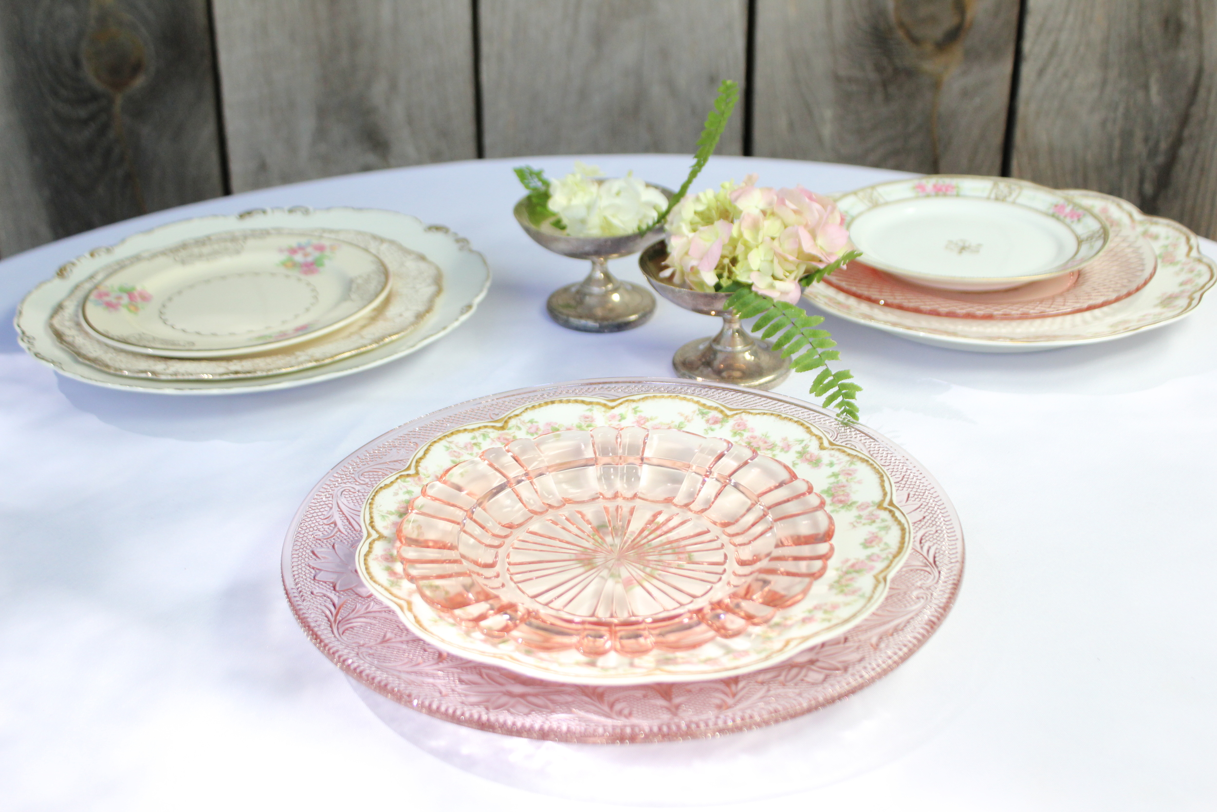 Vintage pink china and Depression glass plates