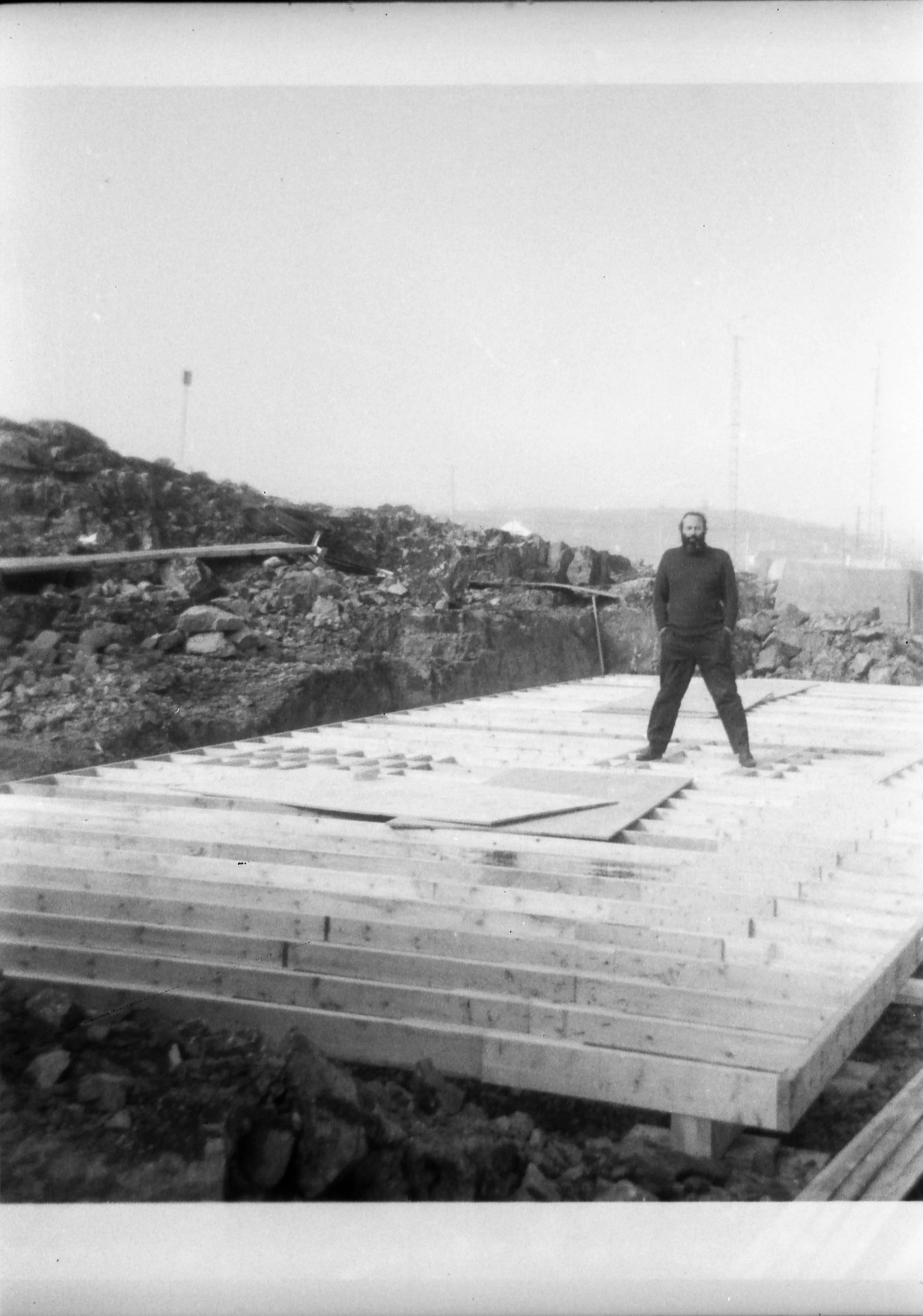A previously unseen photo showing Wil on the new floor of the typography building. I had always understood that there was a cement pad poured where the press was going to be put but clearly you can see that it was just reinforced in two places. Wil is standing on the location of the "Little Giant" press. The other spot, to the left of Wil, is where either the Vandercook 4T or the platen press eventually sat. Photo: HH Johnston Collection, courtesy Sean Johnston.