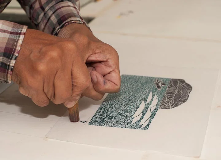 Qiatsuq Niviaqsie applies a home made igloo chop beneath his signature chop.I need to ask whether each stone cut printer has their own igloo chop or if they share the same one.
