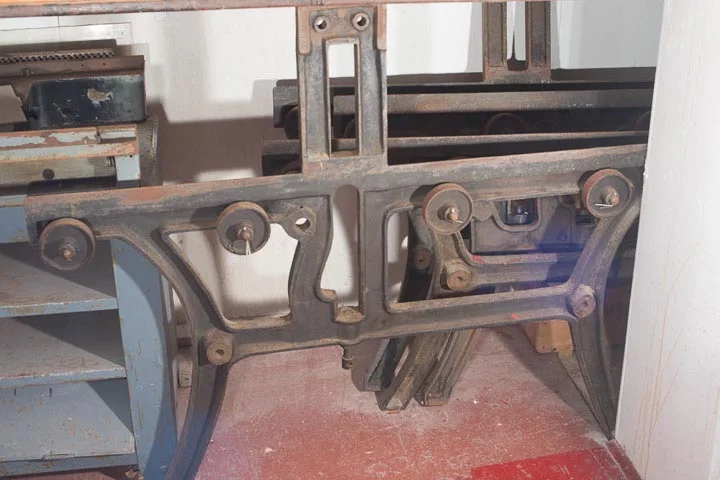 Fuchs and Lang presses in storage. Note the Vandercook to the left before it was restored.