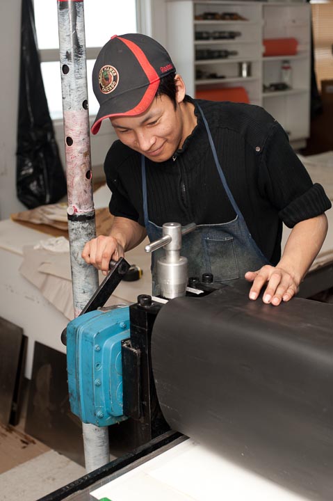Tutuiza Jaw proofing on the larger Charles Brand Press. Tut was an apprentice in the etching area for some time printing a number of small editions.
