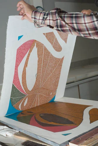 You can see the template in place on Ning’s Swimmers print. Qiatsuq is known for his careful and deliberate manner, an excellent attribute for any stone cut printer.