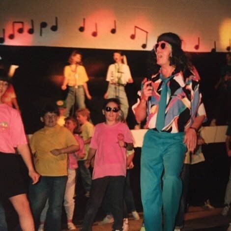 This is my Dad performing in a musical at a school where he was a principal. My Dad knew how to lead with love. I remember him often leaning over to whisper to me, &ldquo;You know what the secret to being a good boss is? You don&rsquo;t act like a bo