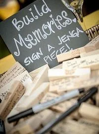 This one is for my brides who love to play games! And not games with guys...board games of course!! Guests write letters on Jenga logs and you can read the letter as you play with your new husband!