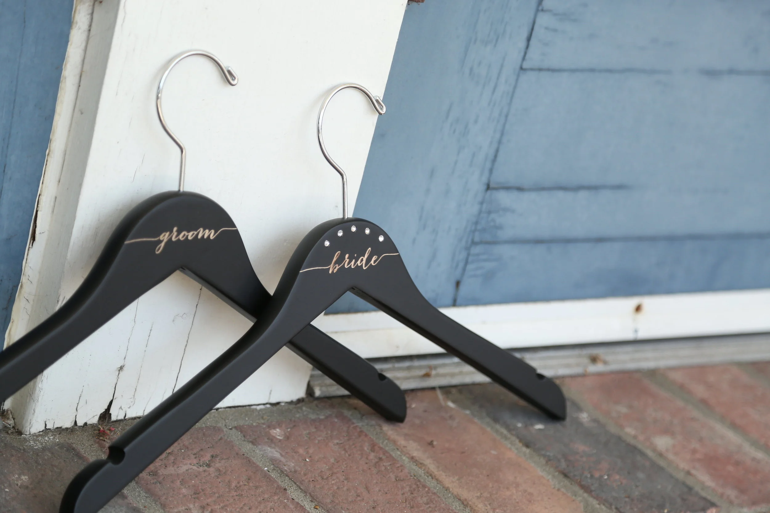 black personalized bridesmaid hangers by black label decor